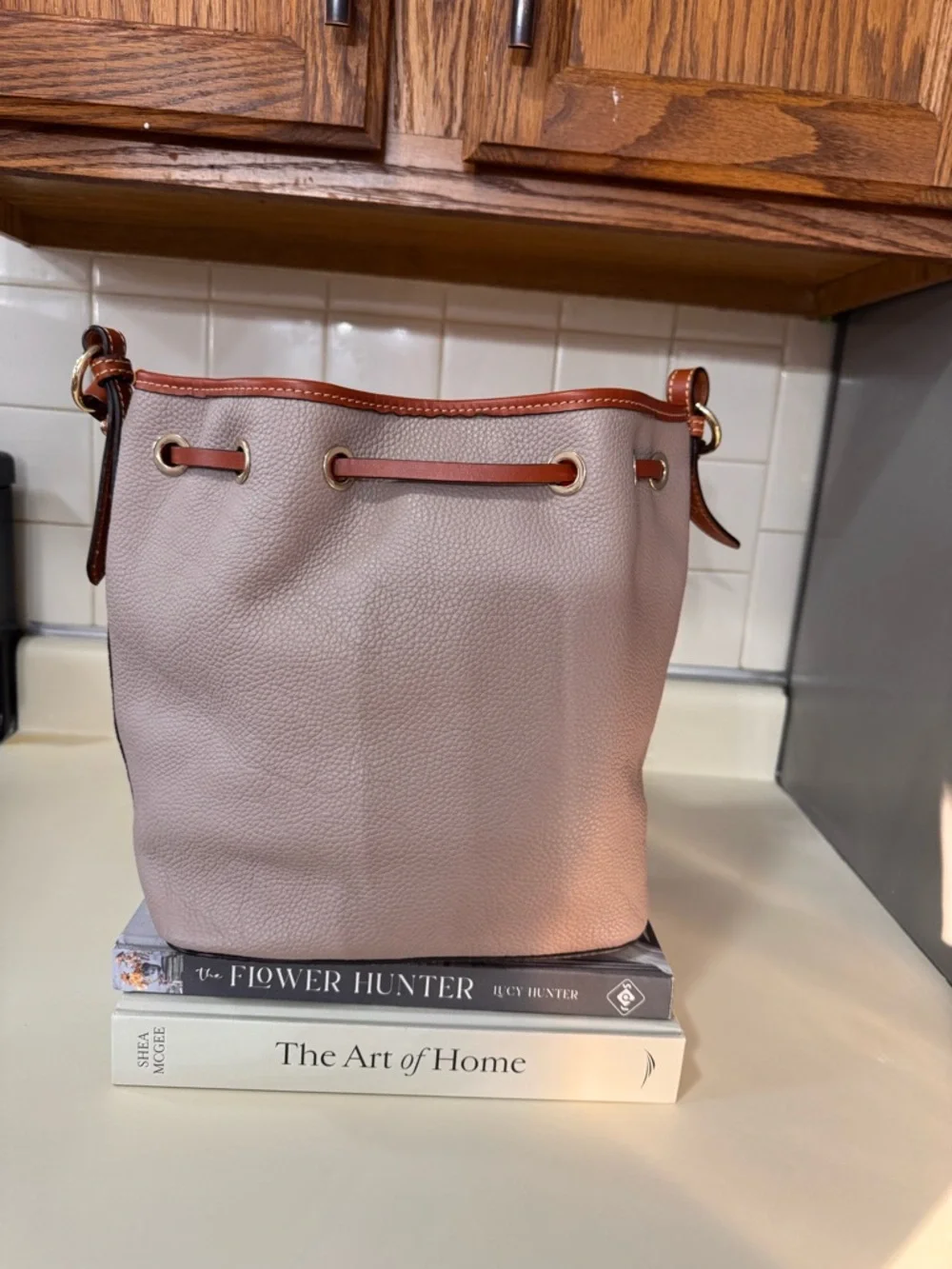Dooney & Bourke Taupe Pebbled Leather Drawstring Bucket Bag with Brown Trim - Picture 5 of 5